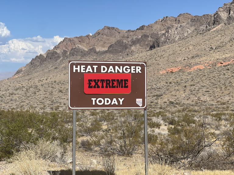 Warning sign reading "Heat Danger Today: Extreme"